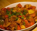 Disposez dans un plat et parsemez de coriandre ciselée.