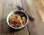 Gratin de pommes de terre, épinards et courgettes